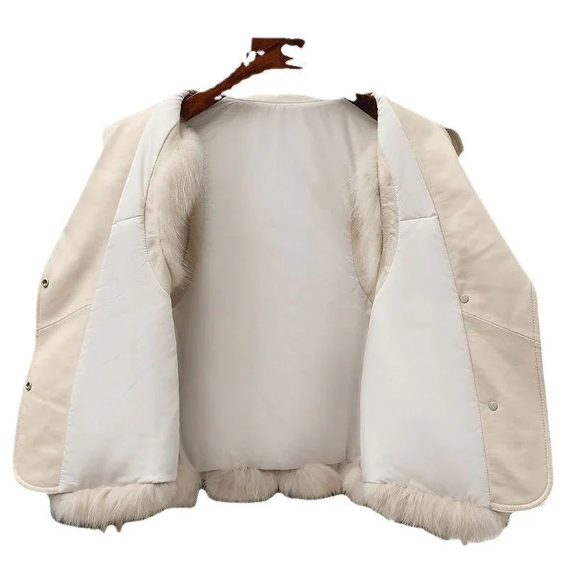 Open beige winter jacket with soft white fur lining and snap button closure