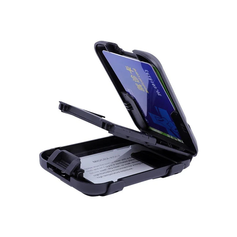 Open black wallet card holder with blue card inside, isolated on white background