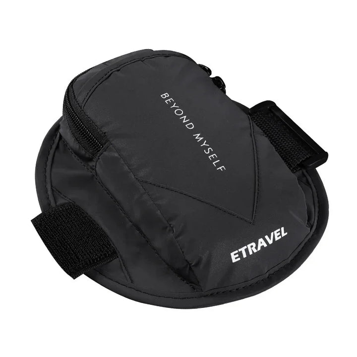 Black ETRAVEL pouch with zipper and 'Beyond Myself' text, travel accessory bag