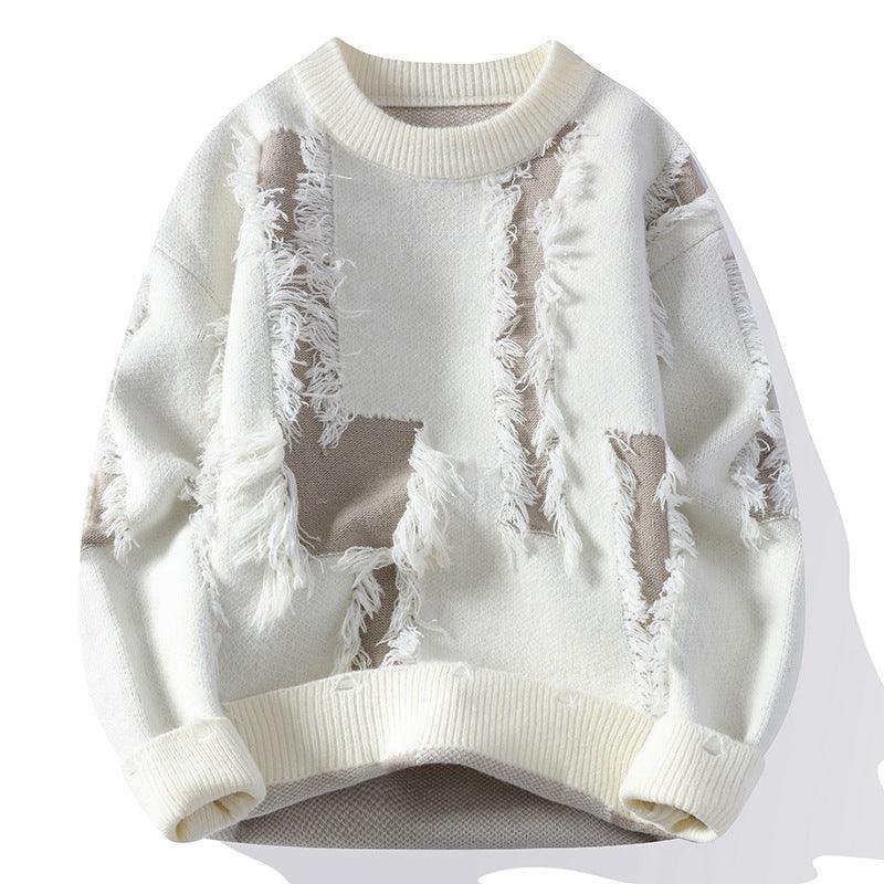 White knit sweater with beige patchwork and fringed details, ribbed cuffs and hem