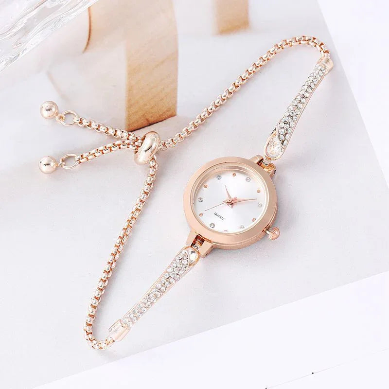 Rose gold women's quartz wristwatch with adjustable bracelet and crystal accents