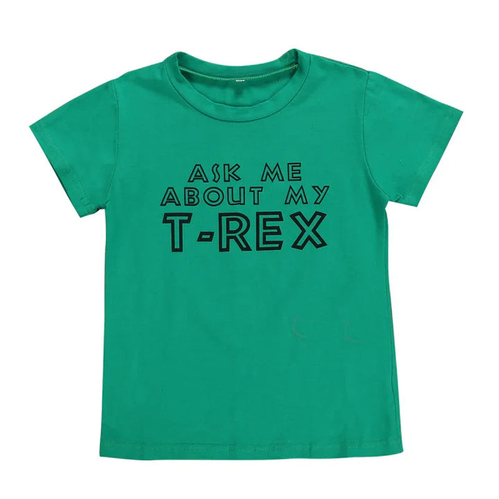 Green kids t-shirt with black text saying Ask me about my T-Rex dinosaur graphic tee