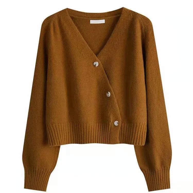 Brown cropped V-neck cardigan with long sleeves and ribbed cuffs and hem, featuring three buttons