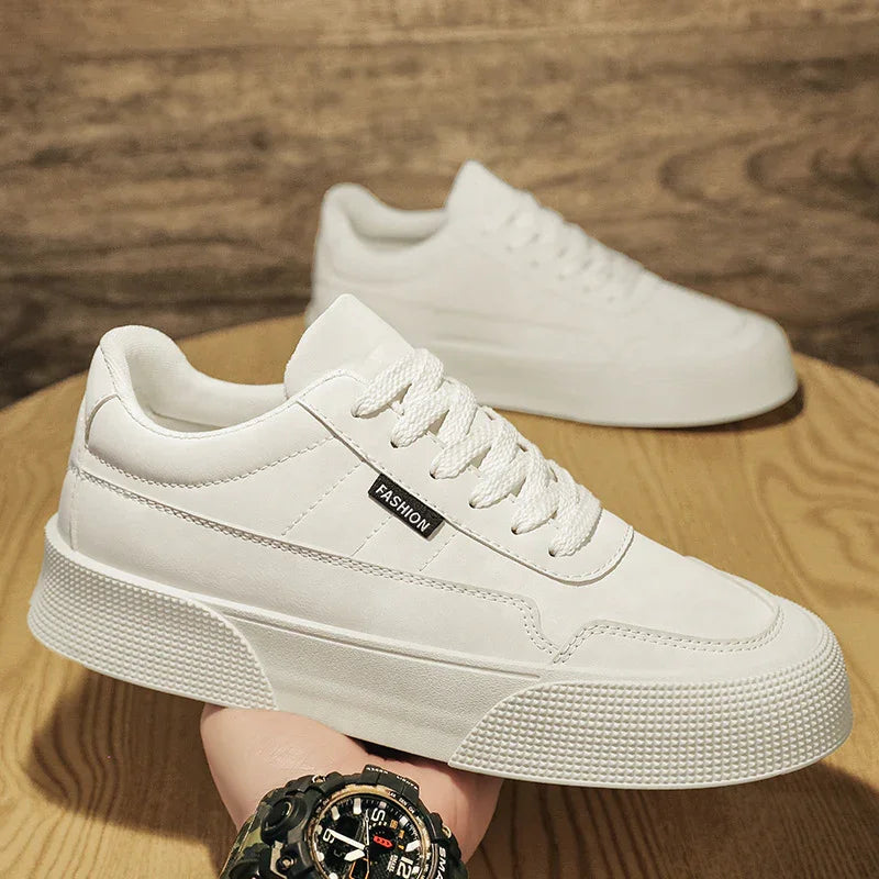 White platform sneakers with thick textured sole and FASHION label on side
