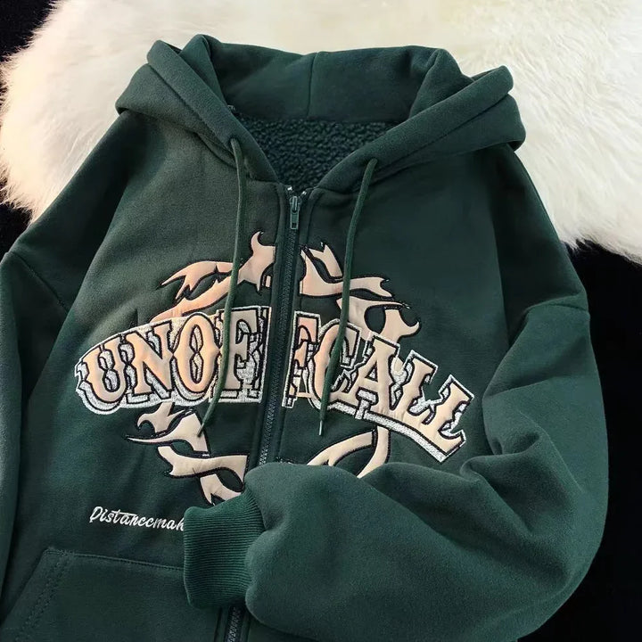 Dark green zip-up hoodie with 'UNOFFICIAL' text and flame design, fleece-lined interior