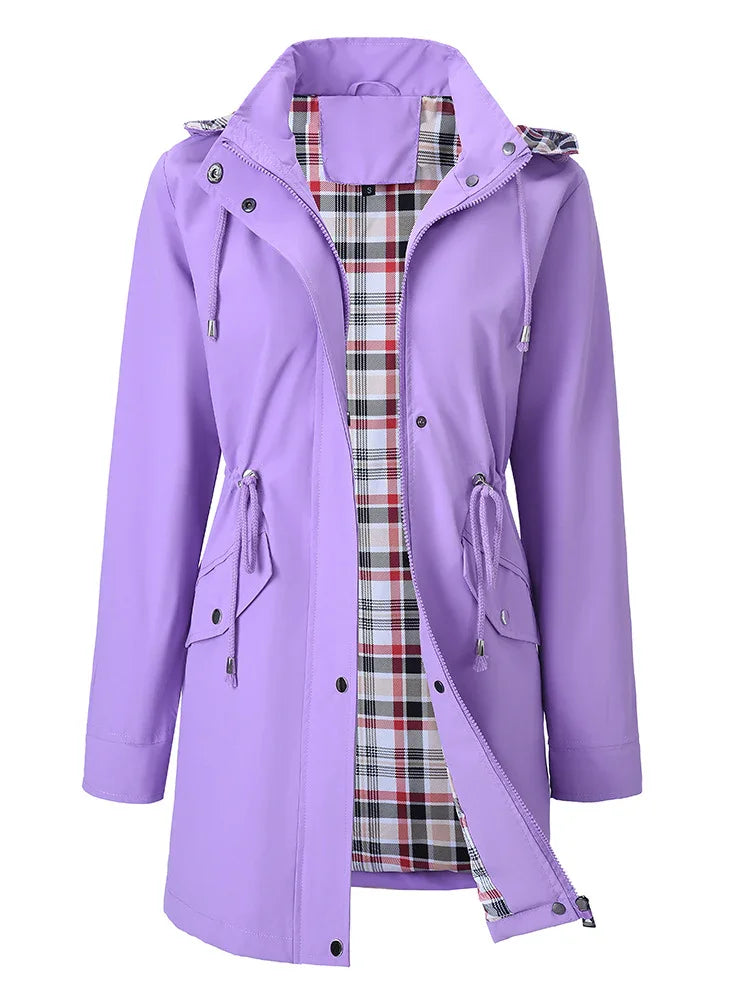 Lilac women's raincoat with hood, drawstring waist, snap buttons, and plaid inner lining