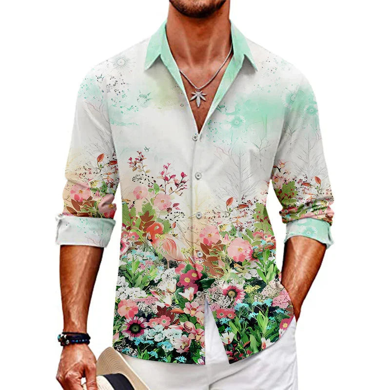 Men's long-sleeve button shirt with colorful floral print and mint green collar, worn with white pants