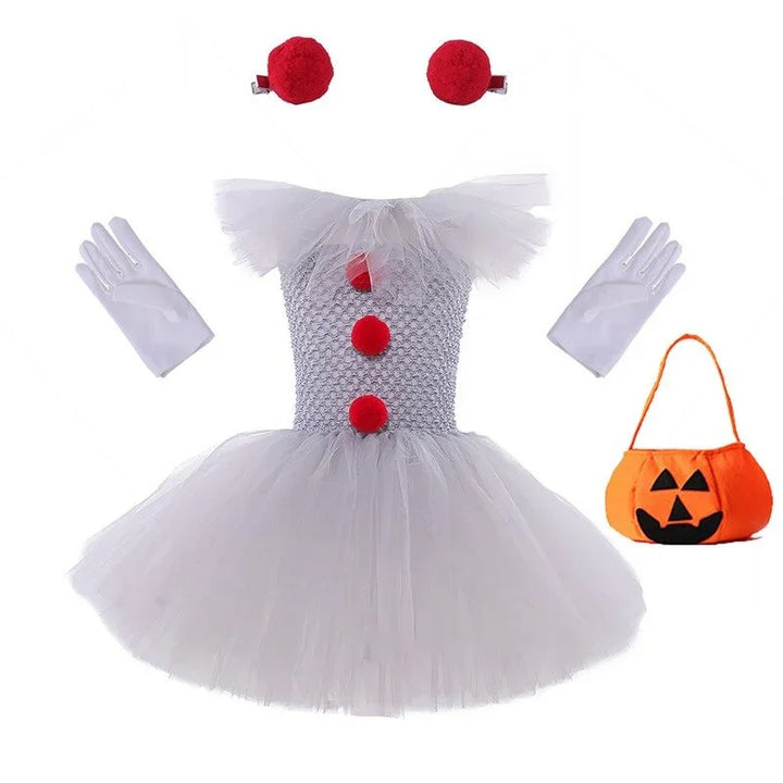 White clown tutu dress with red pom-poms, white gloves, red hair clips, and orange pumpkin trick-or-treat bag
