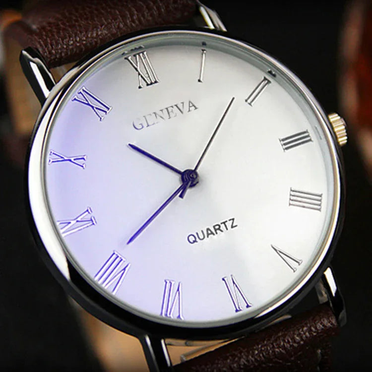Close-up of Geneva quartz wristwatch with white dial, Roman numerals, and brown leather strap