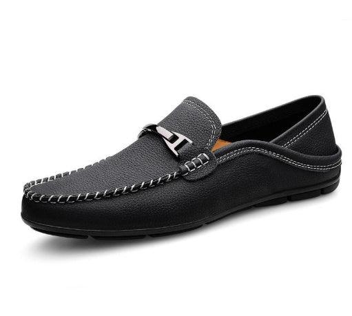 Black leather men's loafer with metal buckle and detailed stitching