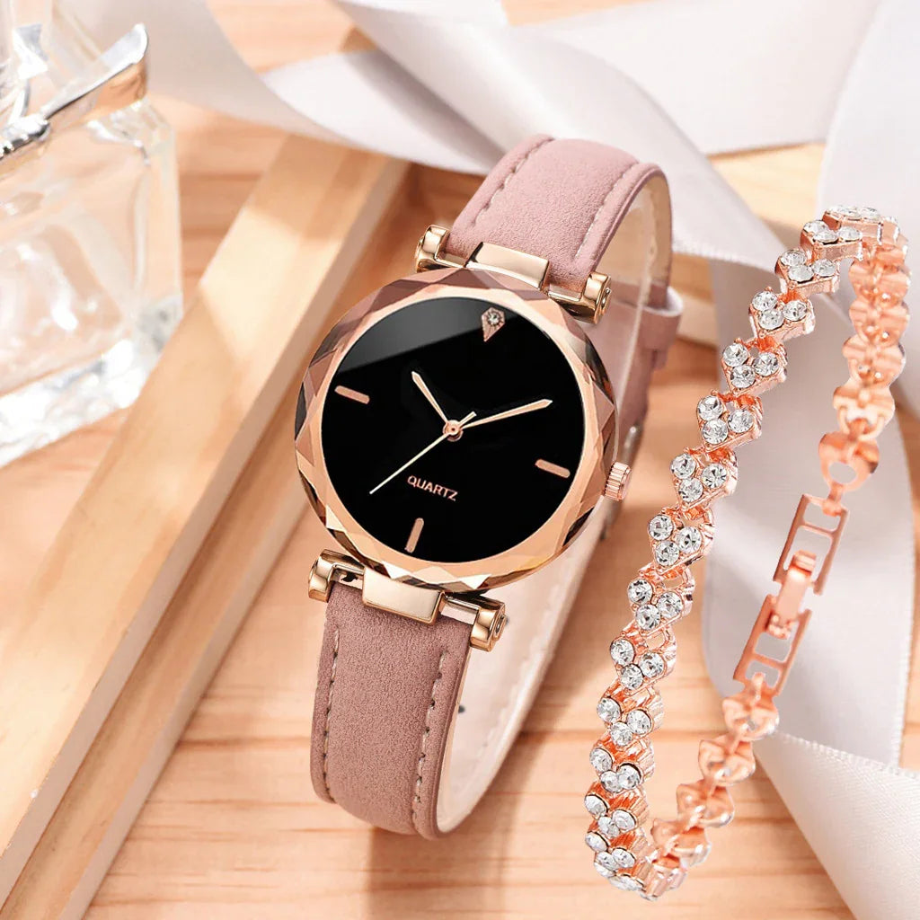 Elegant quartz wristwatch with black dial and pink suede strap beside rose gold crystal bracelet