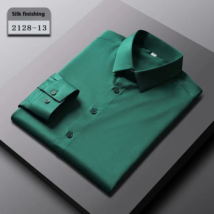 Folded green silk finishing dress shirt 2128-13 on gray surface with collar and button cuffs