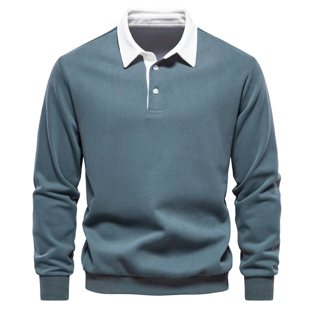 Men's long sleeve blue polo shirt with white collar and button placket