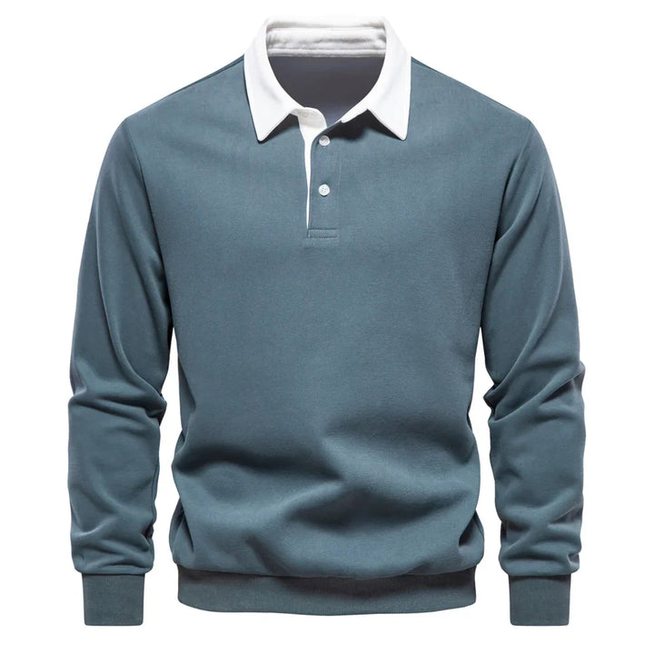 Men's long sleeve blue polo shirt with white collar and button placket