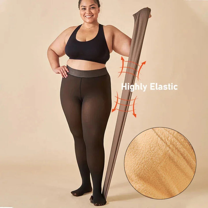 Plus size woman in black sports bra and brown highly elastic leggings, holding stretched leggings with fabric close-up