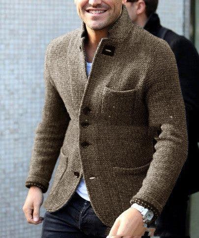 man wearing casual brown wool blazer with buttons and pocket details over white shirt