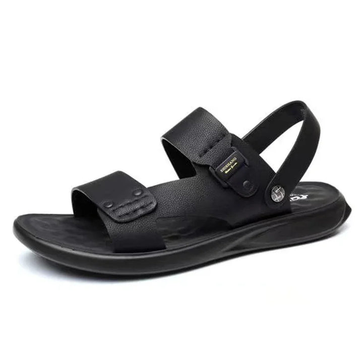 Black casual men's sandal with adjustable straps and cushioned sole on white background
